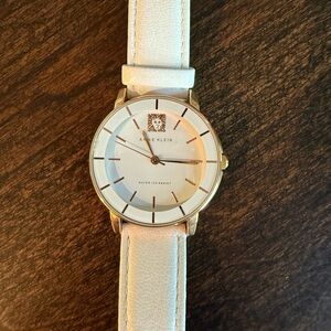 Anne Klein Gold Watch with Cream Leather Strap